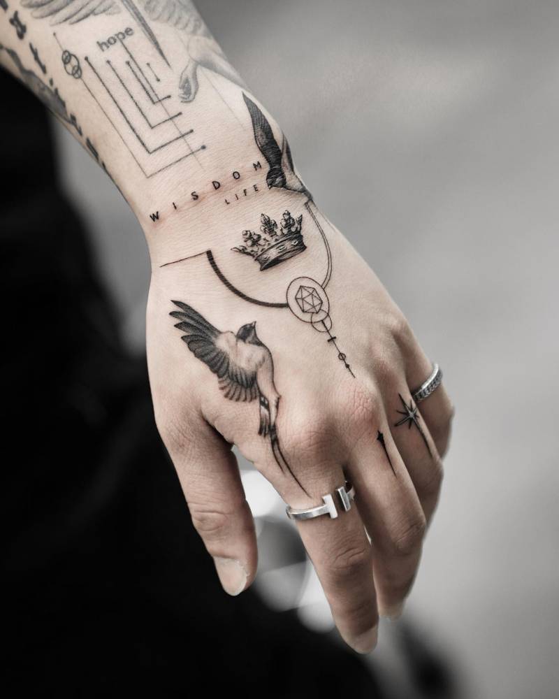 geometric hand tattoo